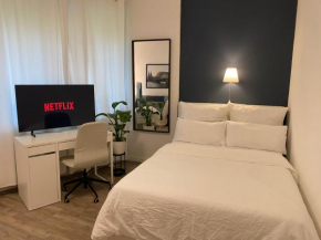 Shared apartment in former hotel, near train station, fully equipped kitchen with washer-dryer